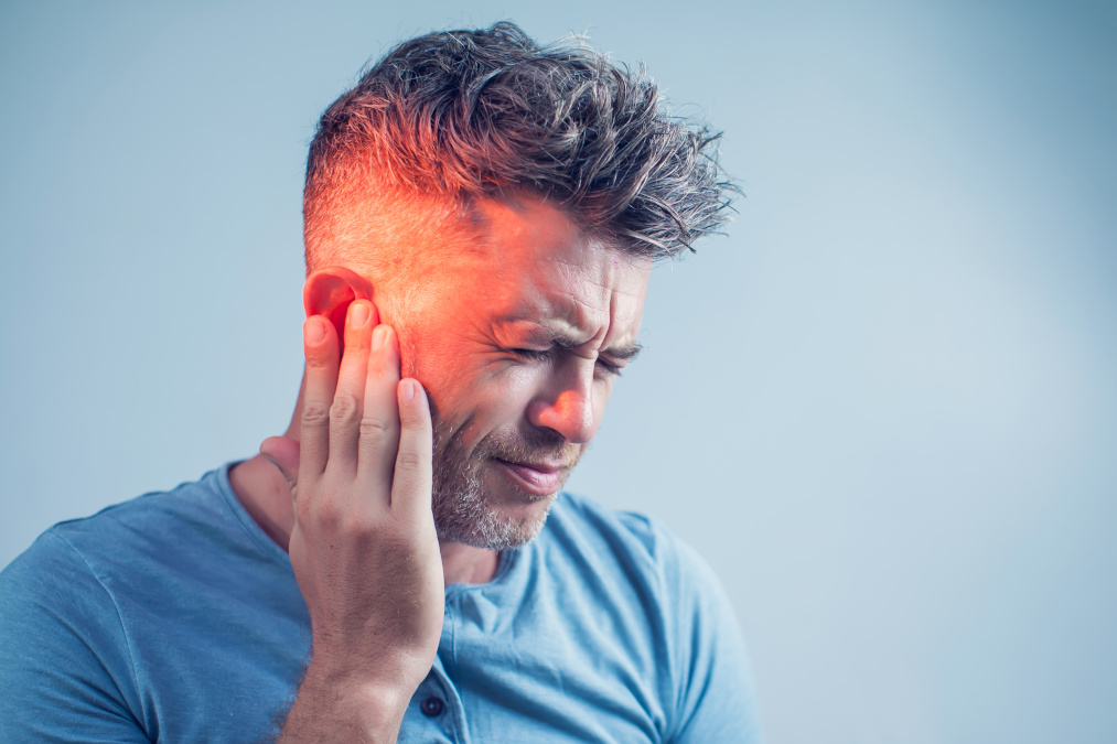 Man suffering from tinnitus